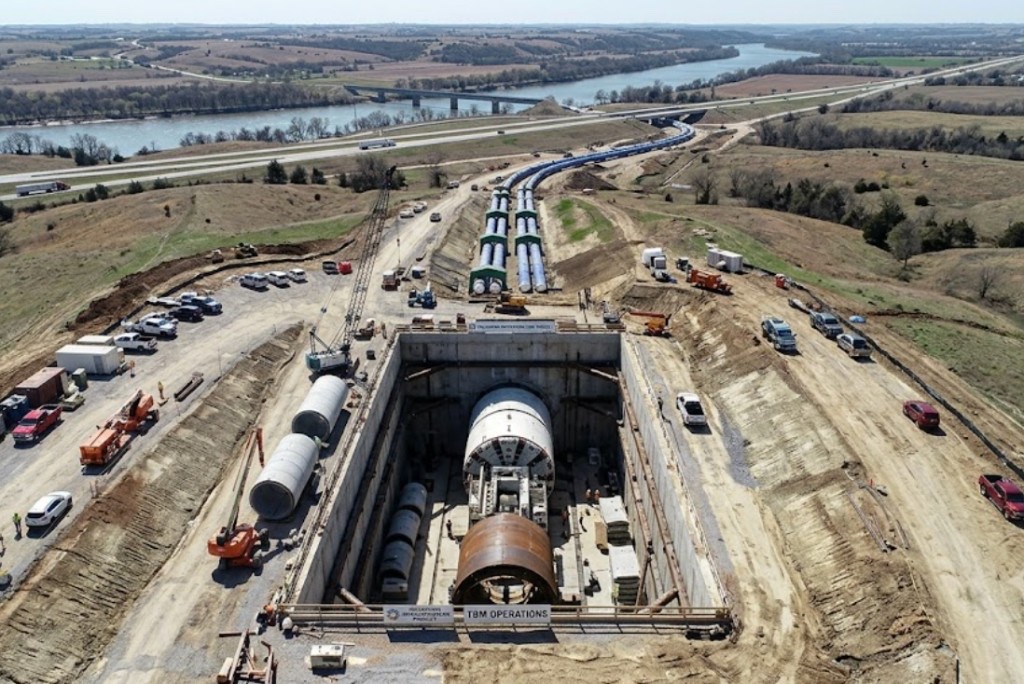 Directional drilling in Muskogee, OK — large-scale directional drilling operation with excavators, HDPE pipe, and full crew on Oklahoma job site